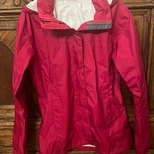 Waterproof and windproof MARMOT rain jacket, size medium.